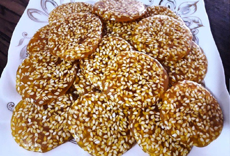 طرز تهیه شیرینی پولکی کنجدی