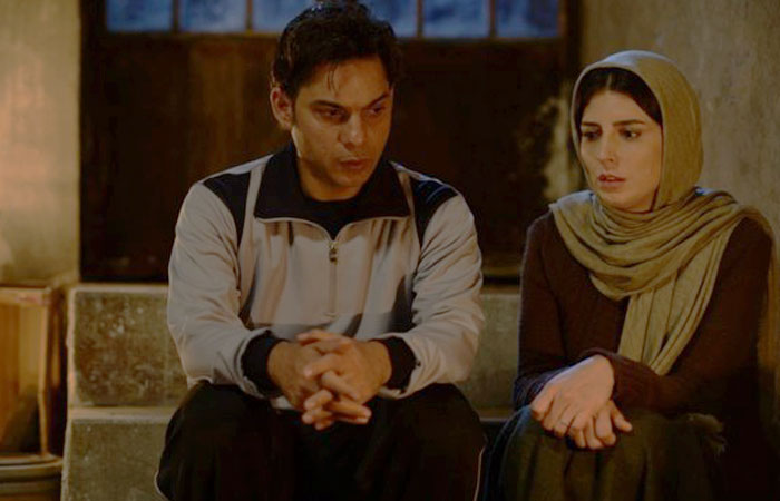 پیمان معادی و لیلا حاتمی در فیلم بمب یک عاشقانه