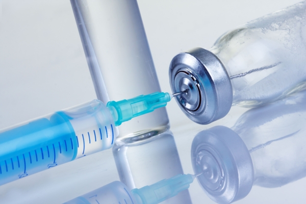 medicine vials and syringe