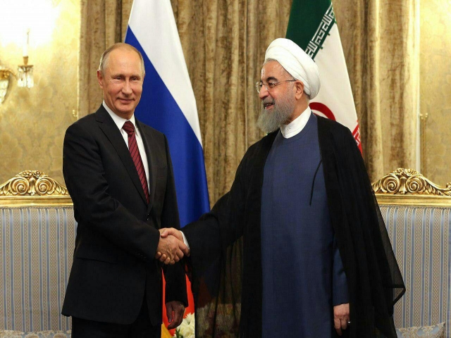 پوتین با روحانی دیدار کرد پوتین با روحانی دیدار کرد